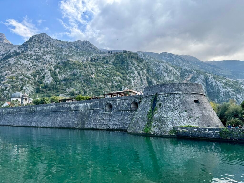 Kotor Ramparts Against Montenegro’s Majestic Mountain Backdrop
